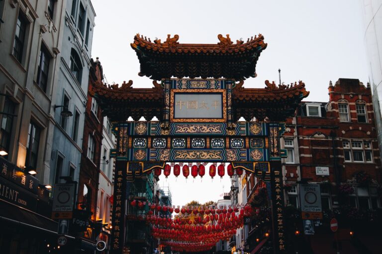 A chinese archway is seen in a city street